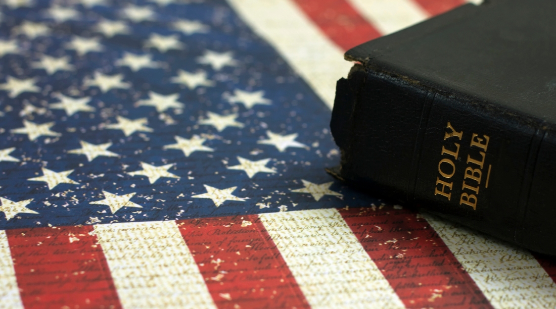 Old Holy Bible and the American Flag